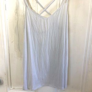 Beyond Yoga workout tank. White with thin grey stripes. Cross back, relaxed fit